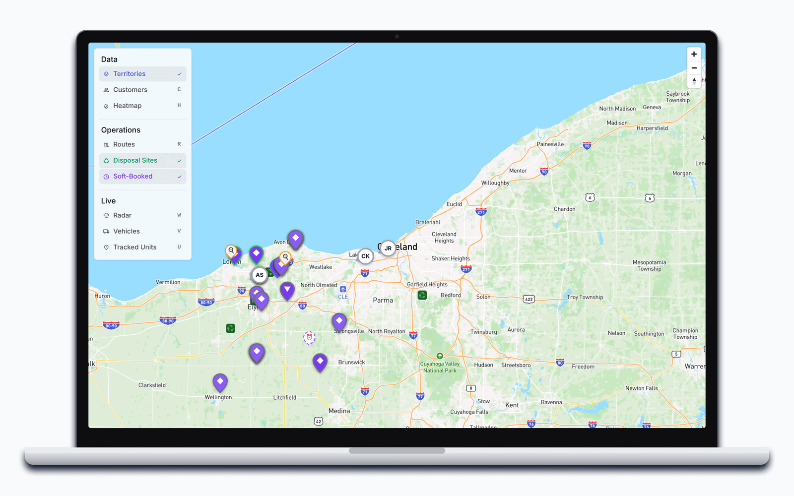 The dispatch map zoomed out to the service area: the day's stops, drivers, and disposal sites, with the Territories layer switched on.