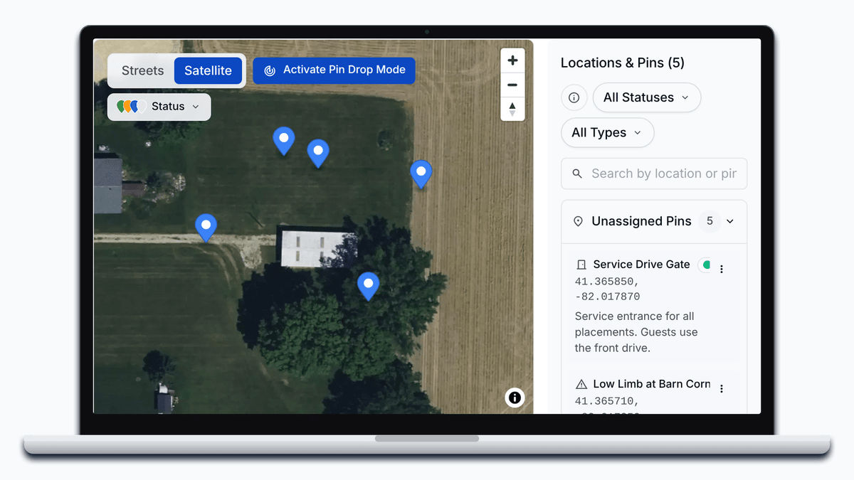 A lead's venue in PortaPro on the satellite map, typed pins for the trailer, restroom bank, handwash, service gate and a hazard beside the pin list.